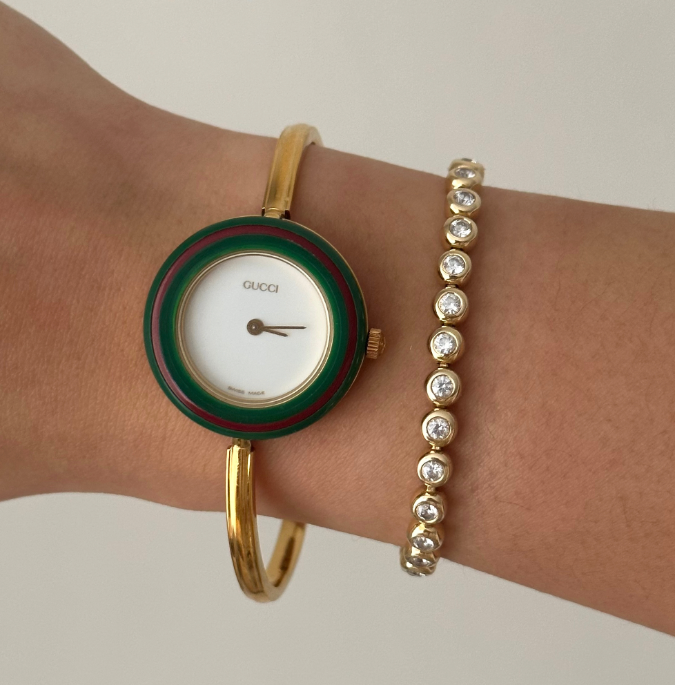 Gucci Gold Bangle Watch w 3 interchangeable bezels