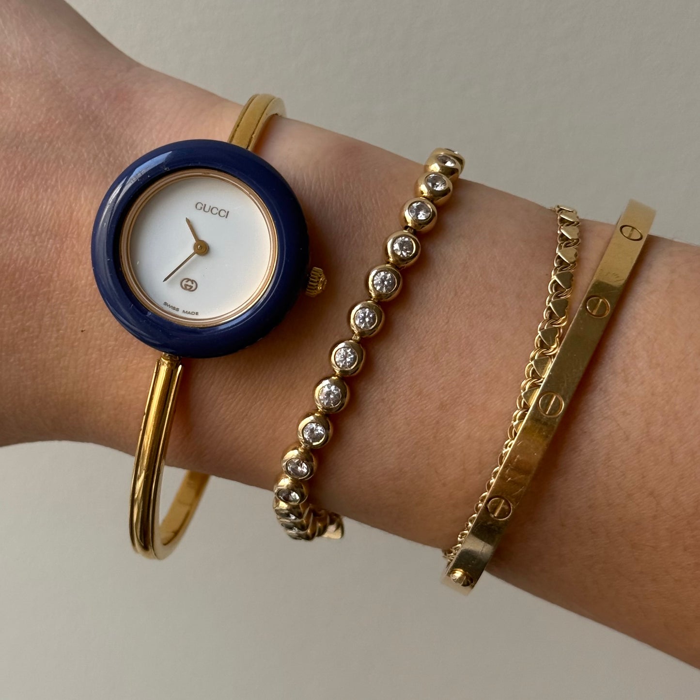 Gucci Gold Bangle Bezel Watch w/ 11 interchangeable Bezels & Box