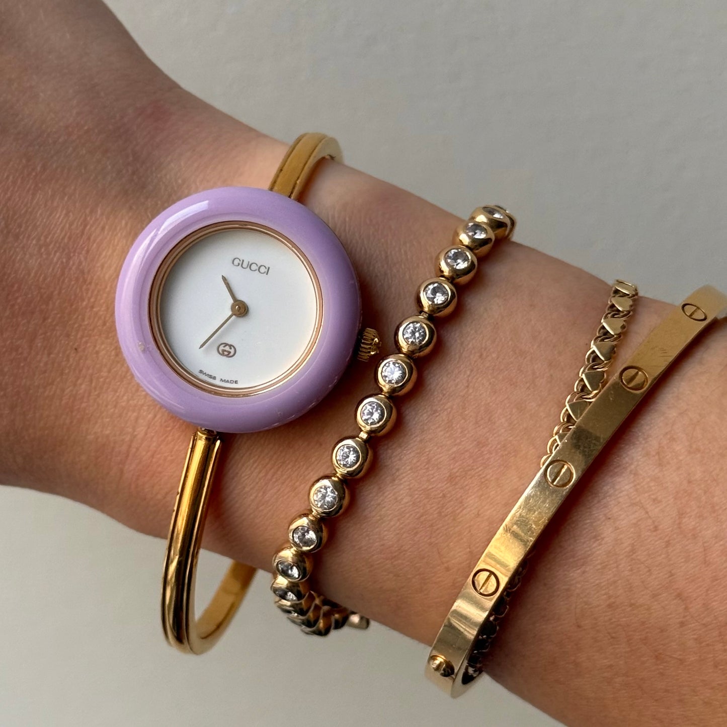 Gucci Gold Bangle Bezel Watch w/ 11 interchangeable Bezels & Box