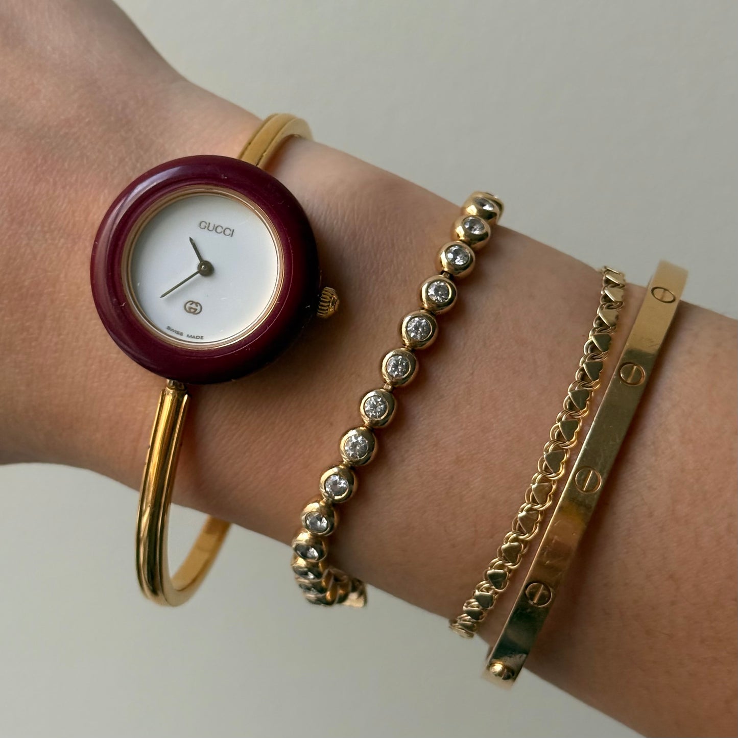 Gucci Gold Bangle Bezel Watch w/ 11 interchangeable Bezels & Box