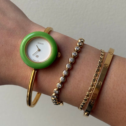 Gucci Gold Bangle Bezel Watch w/ 11 interchangeable Bezels & Box