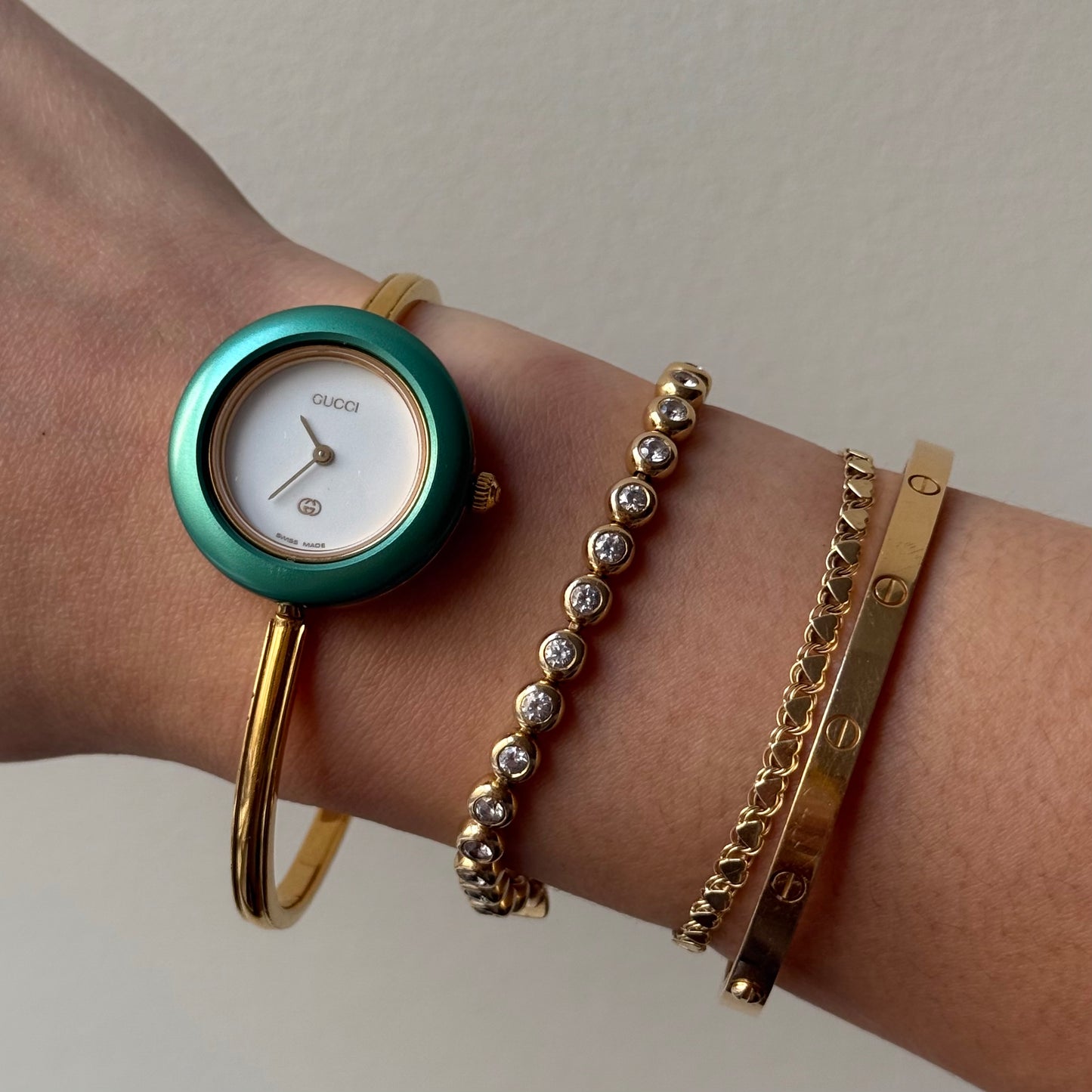 Gucci Gold Bangle Bezel Watch w/ 11 interchangeable Bezels & Box